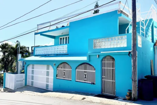 "Comfortable, modernized 5BR 4BA Home with an amazing Ocean View and breeze!