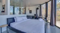 Bel Air Tremblant ROUND LOFT : 1 LIT KING, JACUZZI ET SAUNA - Chalets