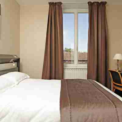 Logis Hotel des Bourbons Rooms