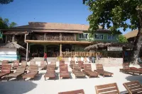 The Boardwalk Village Hotels near Welcome to Negril Sign