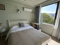 Xichang Fengqing B&B (Qionghai Wetland Park)