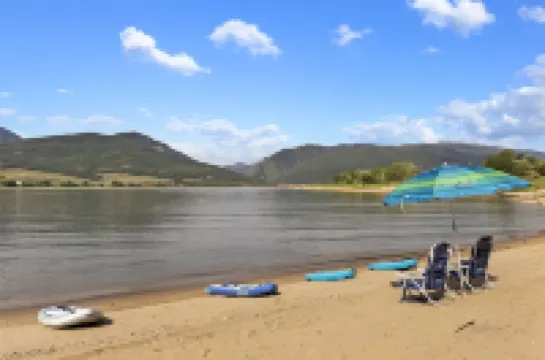 Stunning Lakefront Retreat with Jacuzzi and Unobstructed Mountain Views