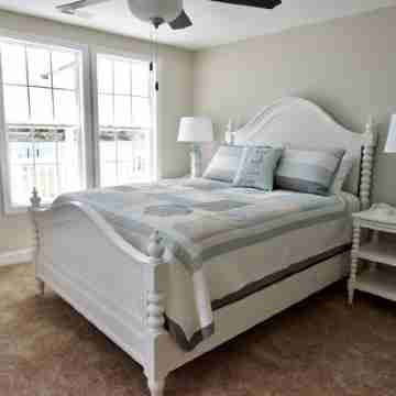 Enjoy a 3-bedroom waterfront vacation home just 10 minutes from Emerald Isle Rooms