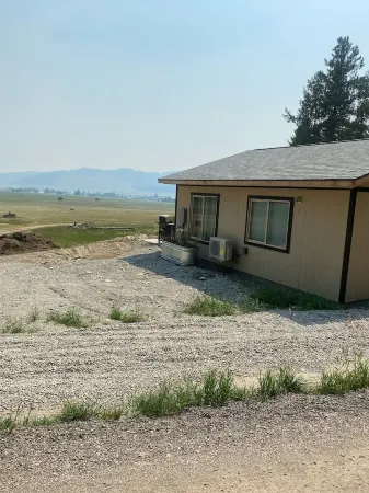 Cabin with peekaboo views of Glacier Park
