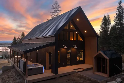 Modern Luxe Cabin w/ Sauna, Hot Tub, and Lake Views