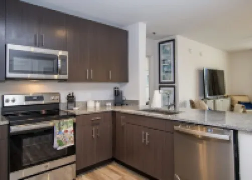 Walk to the square and the grove! This 2BR 2BA is the perfect location.