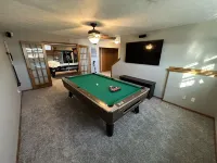 Country home with lake access and game room.