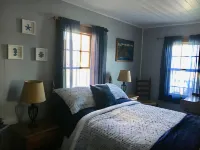 2 bedroom  1 bath, large deck and dock, on the water in peaceful cove,   Year Hotels in Boothbay