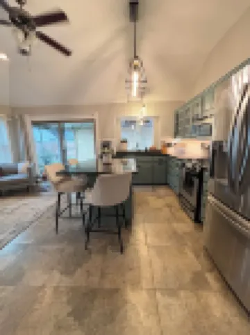 Cozy and cheerful three bedroom home with hot tub.