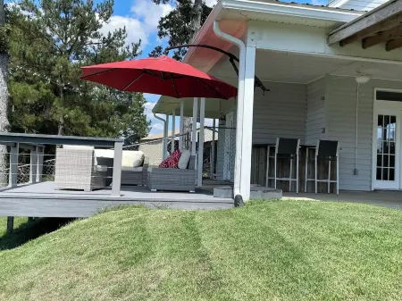 Lakeside Runway Retreat, waterfront kayaks, luxury in the country