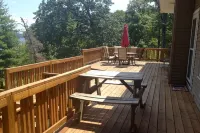Experience Kentucky Lake out the back door! Spacious 4-bedroom retreat awaits.