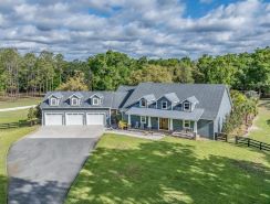 Luxurious 6-bedroom estate with pool, on over 6 fenced in acres