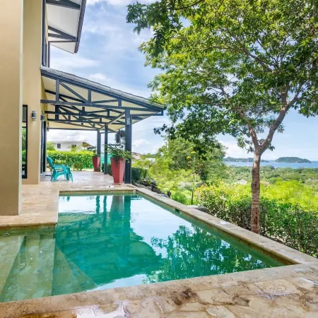 Nostalgic Retro Home on Luxurious Lot with a Private Infinity Pool and Ocean Views