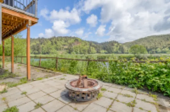Riverfront Firepit Patio and Game Room - Charming Coastal Retreat