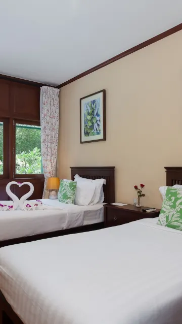 ห้องดีลักซ์ เตียงแฝด พร้อมวิวสวน