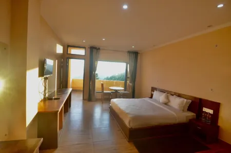 Uttarakhand Resort Отели в г. Каусани