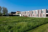 Martin's Rentmeesterij Hotels near De Brug Vroenhoven