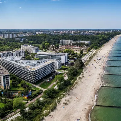 Seaside Kołobrzeg, Sun & Snow Отели рядом с достопримечательностью «Причал Колобжега»