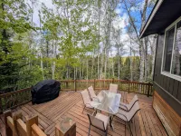 Charming Cabin with Deck and Fireplace - Serene Woodland Escape Hotels in Plum Lake
