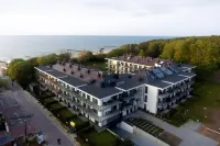 Ground floor apartment with a garden in Niechorze Hotel di Niechorze