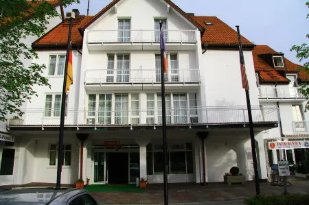 Abasto Hotel Eichenau Отели в г. Ольхинг