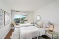Malibu 2-bedroom designer furnished condo with AC. Central to everything!