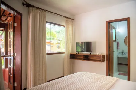 House in Arraial D'ajuda Отели в г. Арраял д'Ажуда