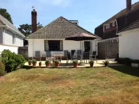 Sandbanks Holiday Home Poole  5 minutes walk to the  BeachSleeps 8/9
