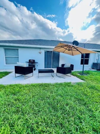 Spacious 4-bedroom house with AC and WiFi in charming Lehigh Acres