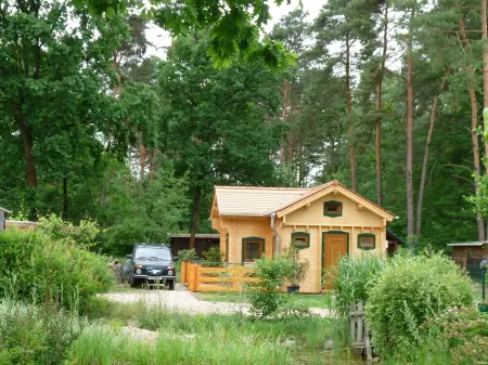Comfortable log house in the forest community of Borkheide Отели в г. Боркхайде