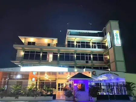 Caribbean Inn Отели в г. Lusignan