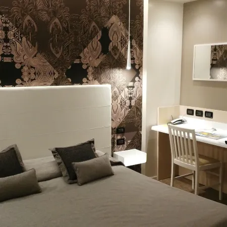 Albergo Suisse Bellevue Отели рядом с достопримечательностью «Пляж Феджина»