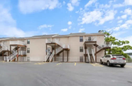 Expansive Views and Community Pool - Stunning Lakefront Oasis