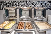 Alexis Inn and Suites Hotel - servizio colazione