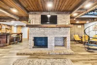 Spacious A-Frame sleeps 25 on 5 wooded acres with a private fishing pond