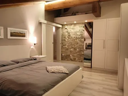 Elegant attic with Dolomites view, relaxation and nature in Levico Terme. Отели в г. Левико-Терме