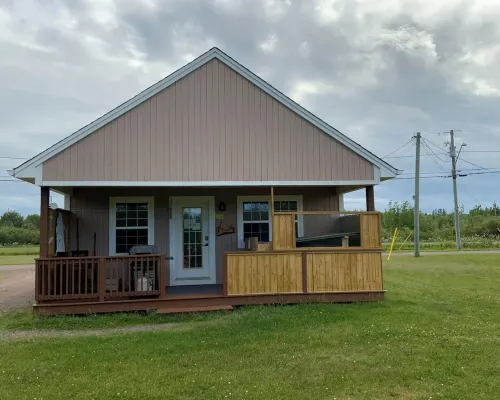 Escape to Seaside Chalet  with hot tub  at Aboiteau Beach , pet friendly Hotels in Cap-Pele