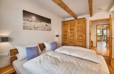 Charming modern apartment "Glitzeralm" close to the ski and Three Lakes area. Отели в г. Райт