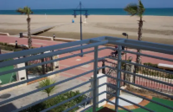 Apartment on the beachfront with pool and parking