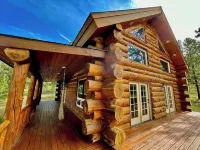 Custom log cabin tucked away in private forest