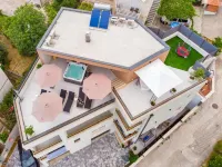 Three-Bedroom Penthouse Apartment - Apartments