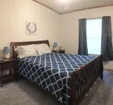 Waterfront home on a beautiful wooded, private1 acre lot on Sam Rayburn.