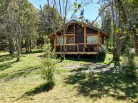 Wonderful Rustic Cabin 2, with Native Logs, on the Banks of the Trancura River Hotels near Pucon playa Colo Colo.