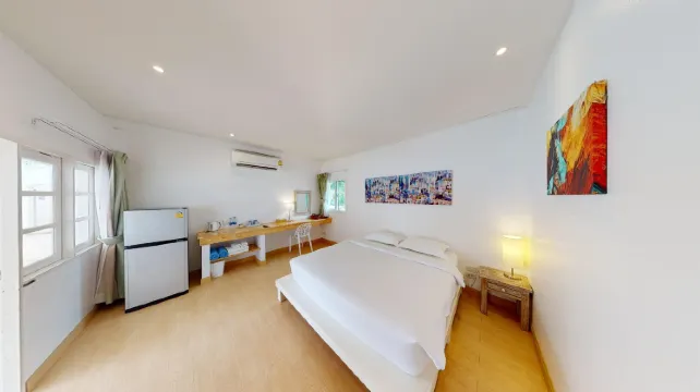 ห้องดีลักซ์ เตียงใหญ่ 1 เตียง