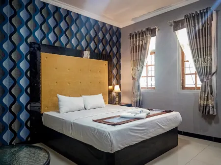 Hotel Nirwana Отели рядом с достопримечательностью «Симпанг Лайма Картохархо»