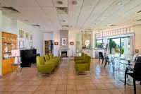 Natura Beach Hotel and Villas - bar