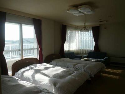 新館4ベッド ビジネスホテル きたぐにの写真