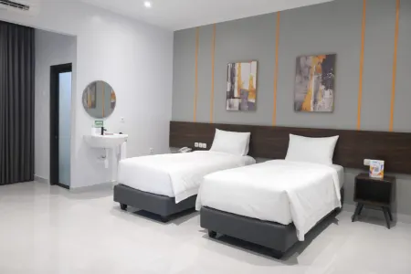 Atap Biru Residence Отели рядом с достопримечательностью «Tugu Muda»