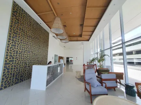 Minimalist Condo in Azure North Отели рядом с достопримечательностью «Don Honorio Ventura Technological State University, Sto. Tomas Campus»