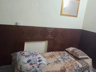 ROOM 9 Serene Retreat in Rawalpindi - Your Home Away from Home 1